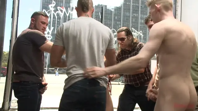 Poster: Muscled whore gets publicly fucked and doused with cum