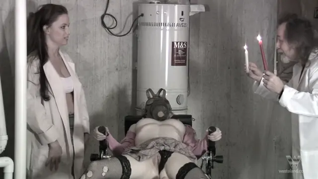 Poster: Redhead teen cums hard from wax and machine