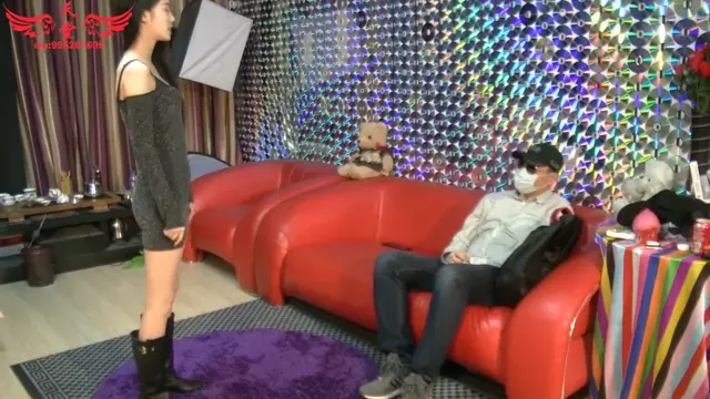 Poster: Asian girl boots removed and tickled