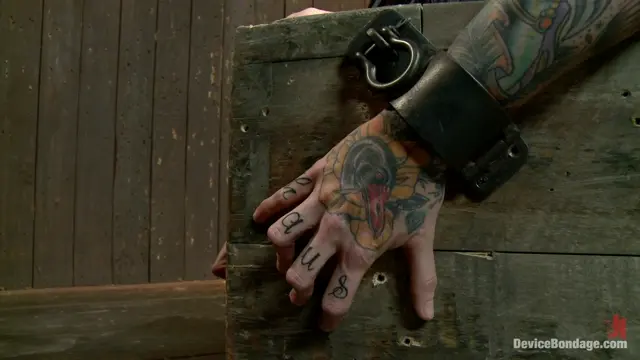 Poster: Kathryn Dupri Submits to Leather Restraint