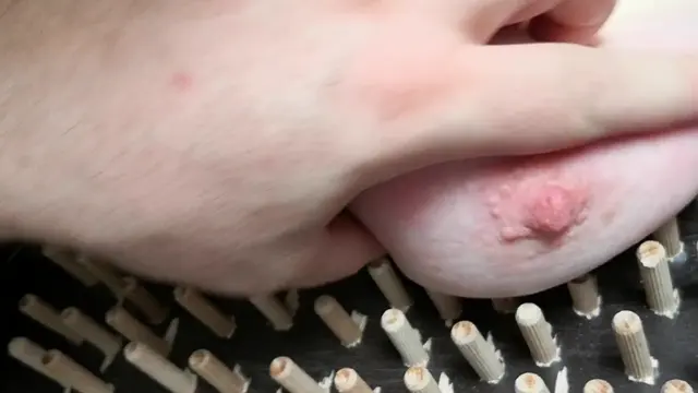 Poster: Tit punishing machine