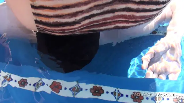 Poster: menareslaves miss bliss face sitting in the pool menareslaves